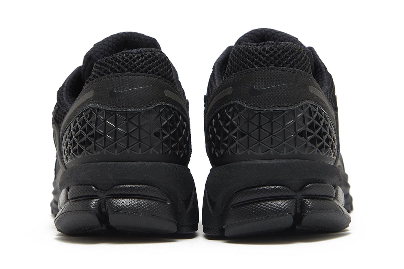 First Look at the Nike Zoom Vomero 5 "Triple Black" Black/Black-White releasing 2023 sleek black everyday sneakers shoes nike swoosh all black