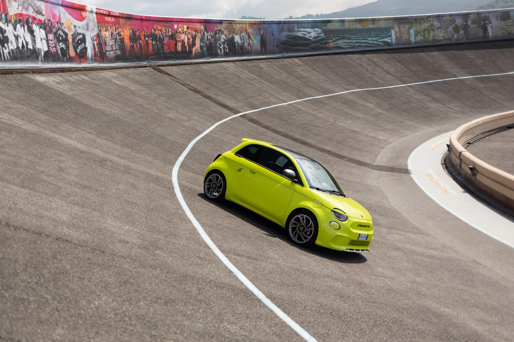 abarth 500e turismo test drive electric fiat turin italy sound generator acid green scorpion sports allow wheels interiors