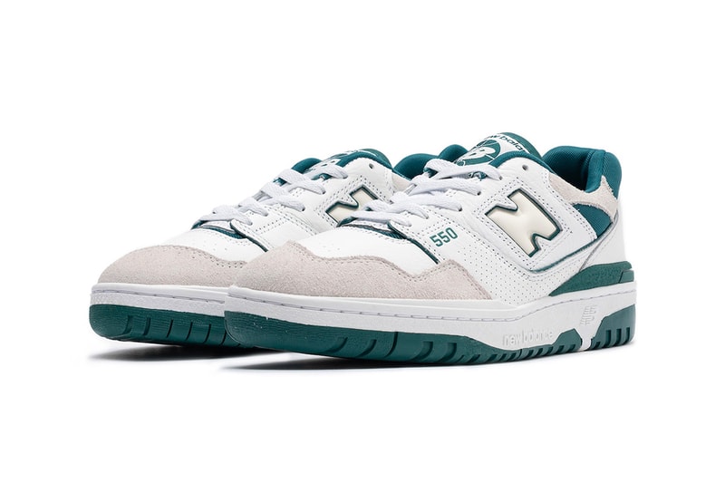 New Balance 550 sneakers in white with green detail