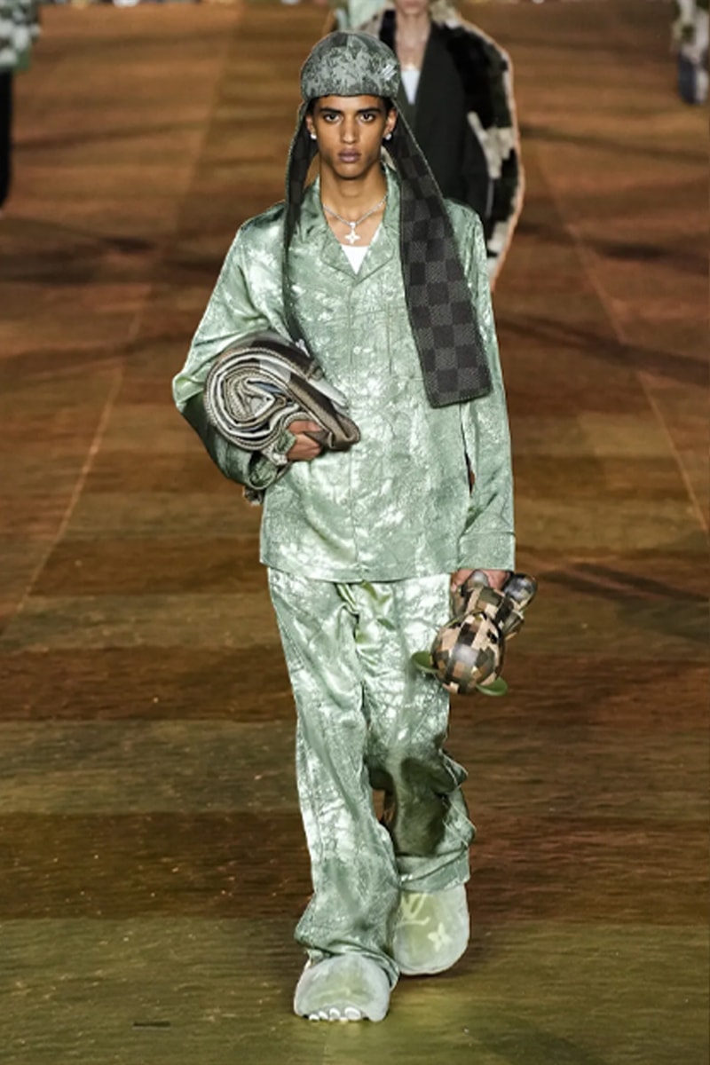 Pharrell's SS24 Louis Vuitton Debut Was Nothing Short of a Spectacle Paris fashion week pont neuf jay z beyonce rihanna asap rocky asap ferg pusha t verdy pharrell williams maluma jbalvin lewis hamilton fenty