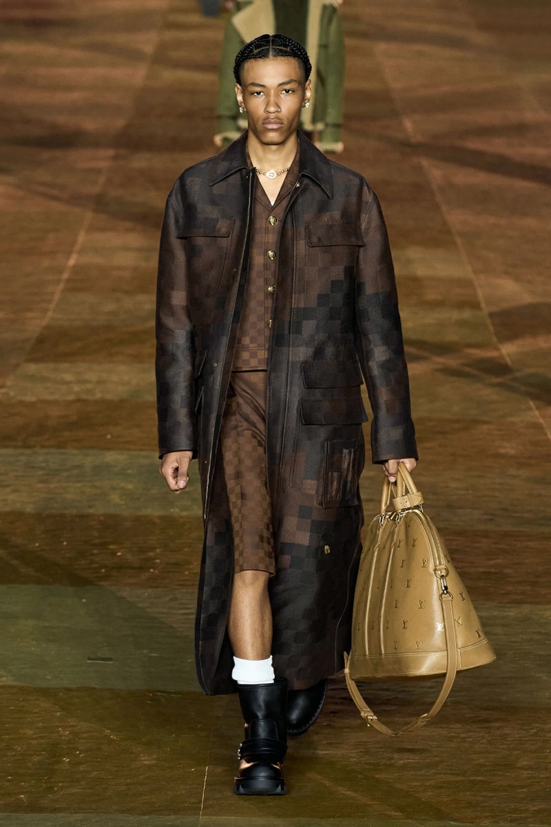 Pharrell's SS24 Louis Vuitton Debut Was Nothing Short of a Spectacle Paris fashion week pont neuf jay z beyonce rihanna asap rocky asap ferg pusha t verdy pharrell williams maluma jbalvin lewis hamilton fenty