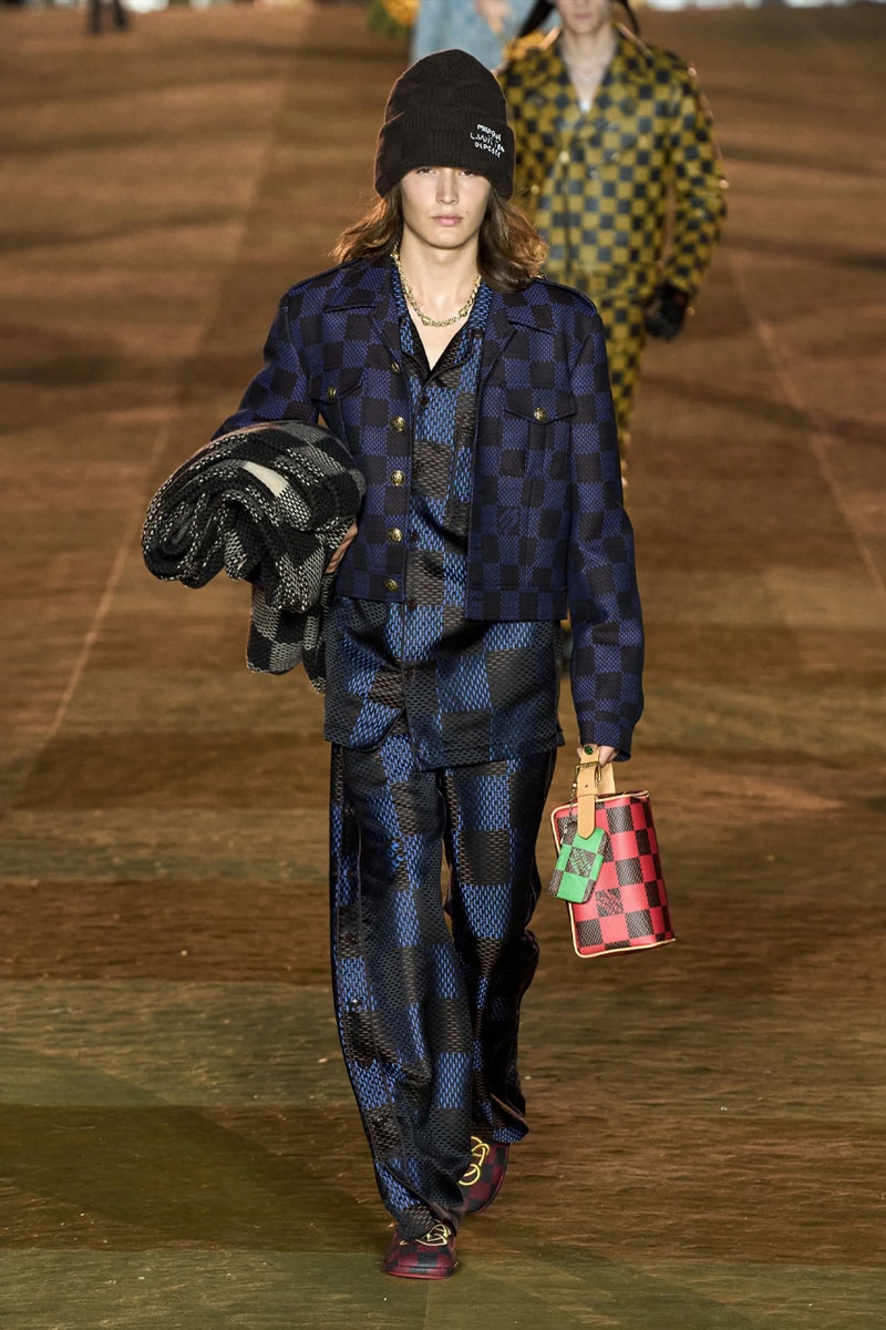Pharrell's SS24 Louis Vuitton Debut Was Nothing Short of a Spectacle Paris fashion week pont neuf jay z beyonce rihanna asap rocky asap ferg pusha t verdy pharrell williams maluma jbalvin lewis hamilton fenty