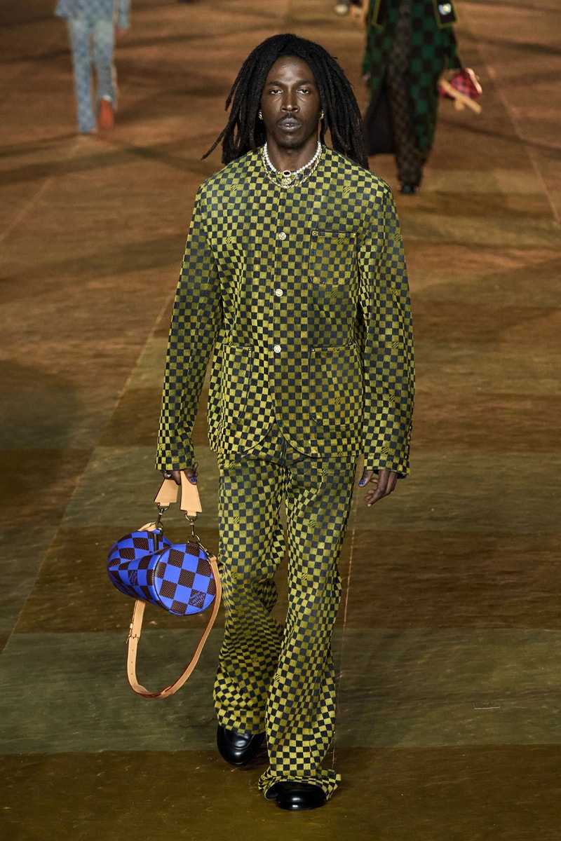 Pharrell's SS24 Louis Vuitton Debut Was Nothing Short of a Spectacle Paris fashion week pont neuf jay z beyonce rihanna asap rocky asap ferg pusha t verdy pharrell williams maluma jbalvin lewis hamilton fenty