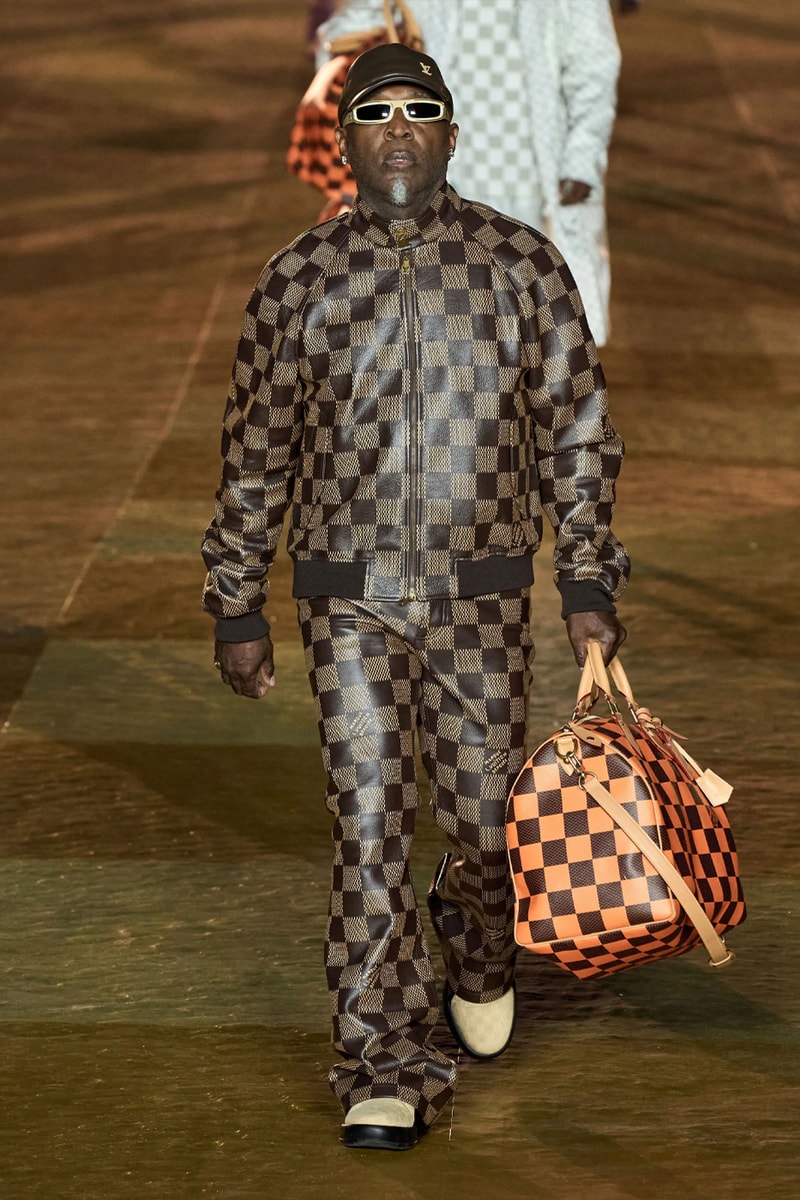 Pharrell's SS24 Louis Vuitton Debut Was Nothing Short of a Spectacle Paris fashion week pont neuf jay z beyonce rihanna asap rocky asap ferg pusha t verdy pharrell williams maluma jbalvin lewis hamilton fenty
