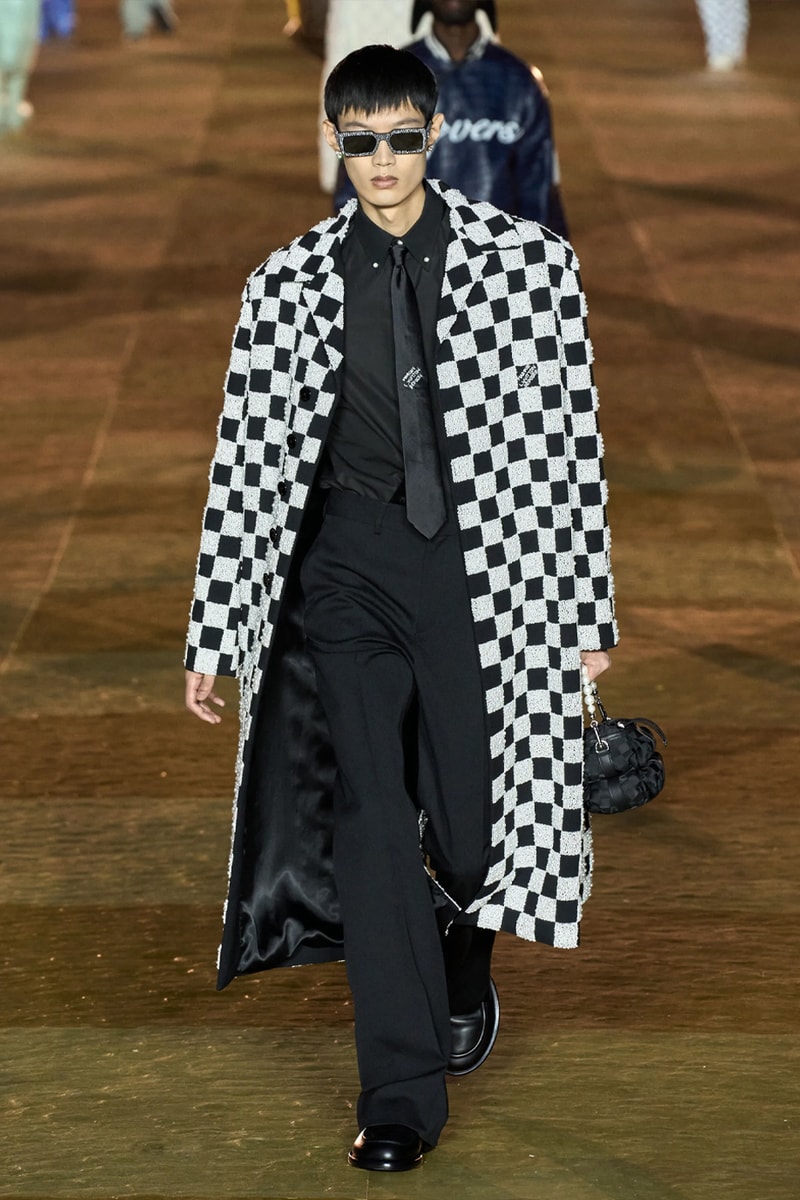 Pharrell's SS24 Louis Vuitton Debut Was Nothing Short of a Spectacle Paris fashion week pont neuf jay z beyonce rihanna asap rocky asap ferg pusha t verdy pharrell williams maluma jbalvin lewis hamilton fenty