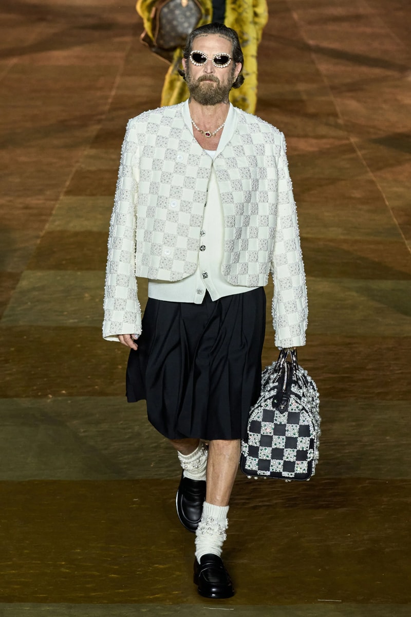 Pharrell's SS24 Louis Vuitton Debut Was Nothing Short of a Spectacle Paris fashion week pont neuf jay z beyonce rihanna asap rocky asap ferg pusha t verdy pharrell williams maluma jbalvin lewis hamilton fenty