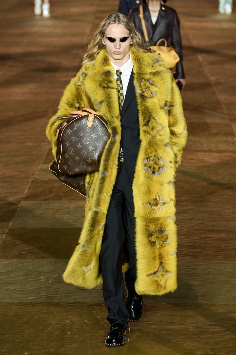 Pharrell's SS24 Louis Vuitton Debut Was Nothing Short of a Spectacle Paris fashion week pont neuf jay z beyonce rihanna asap rocky asap ferg pusha t verdy pharrell williams maluma jbalvin lewis hamilton fenty