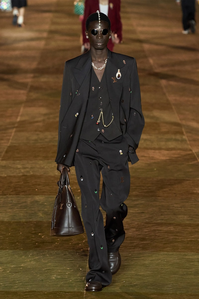 Pharrell's SS24 Louis Vuitton Debut Was Nothing Short of a Spectacle Paris fashion week pont neuf jay z beyonce rihanna asap rocky asap ferg pusha t verdy pharrell williams maluma jbalvin lewis hamilton fenty