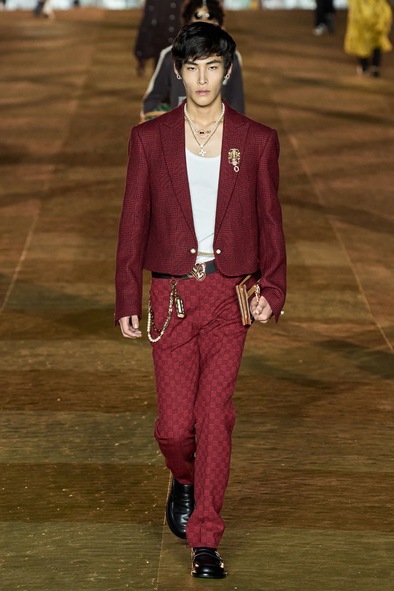 Pharrell's SS24 Louis Vuitton Debut Was Nothing Short of a Spectacle Paris fashion week pont neuf jay z beyonce rihanna asap rocky asap ferg pusha t verdy pharrell williams maluma jbalvin lewis hamilton fenty