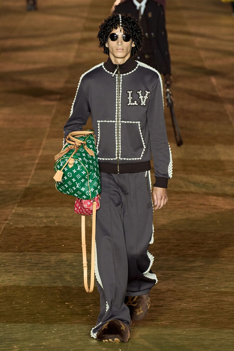 Pharrell's SS24 Louis Vuitton Debut Was Nothing Short of a Spectacle Paris fashion week pont neuf jay z beyonce rihanna asap rocky asap ferg pusha t verdy pharrell williams maluma jbalvin lewis hamilton fenty