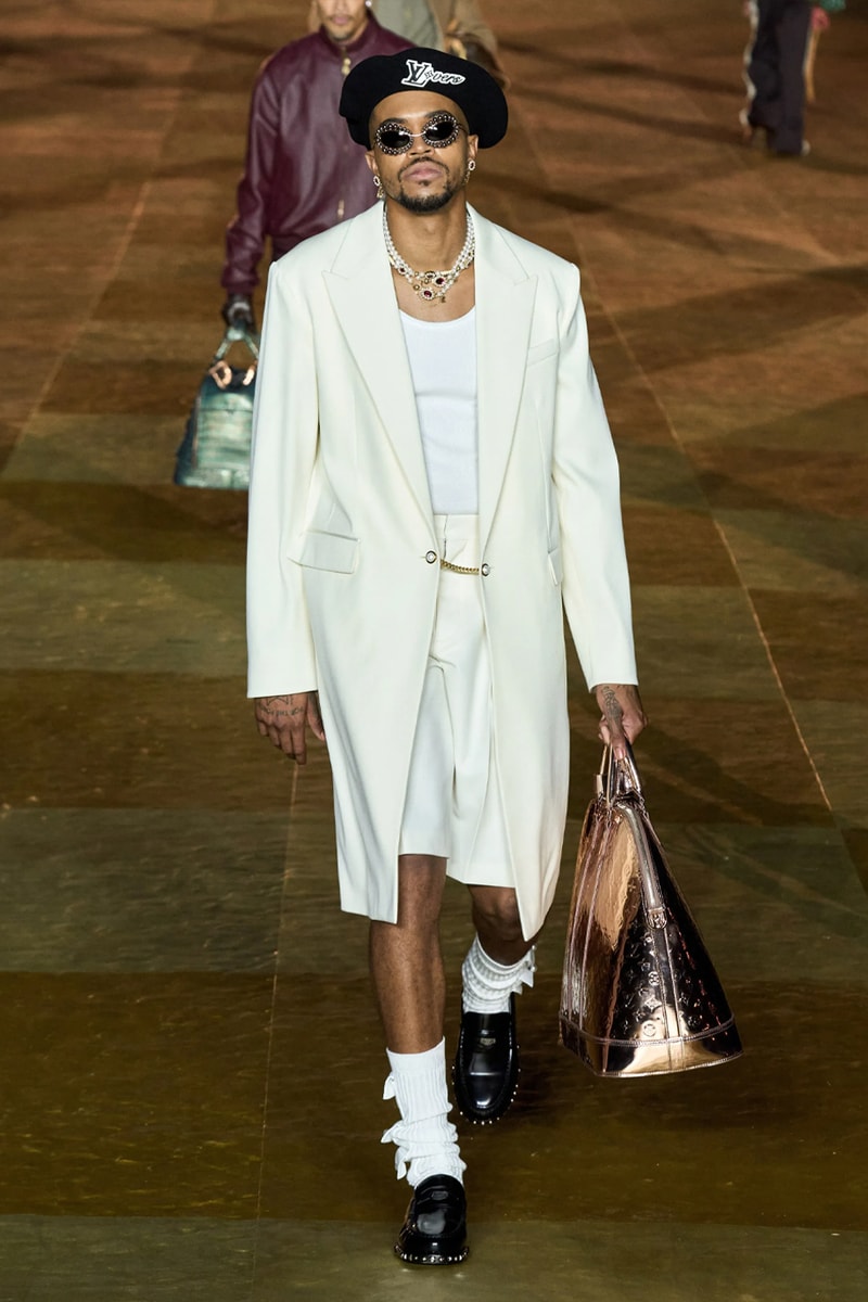 Pharrell's SS24 Louis Vuitton Debut Was Nothing Short of a Spectacle Paris fashion week pont neuf jay z beyonce rihanna asap rocky asap ferg pusha t verdy pharrell williams maluma jbalvin lewis hamilton fenty