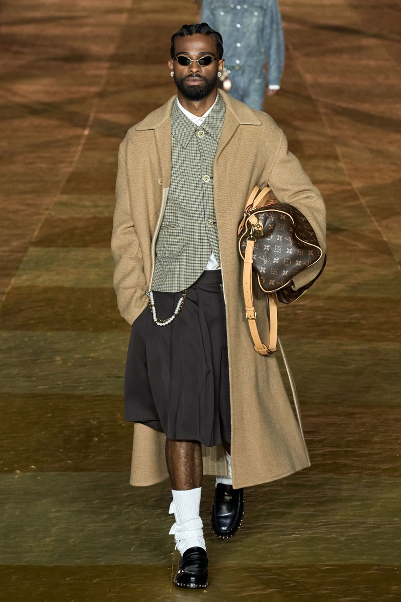 Pharrell's SS24 Louis Vuitton Debut Was Nothing Short of a Spectacle Paris fashion week pont neuf jay z beyonce rihanna asap rocky asap ferg pusha t verdy pharrell williams maluma jbalvin lewis hamilton fenty