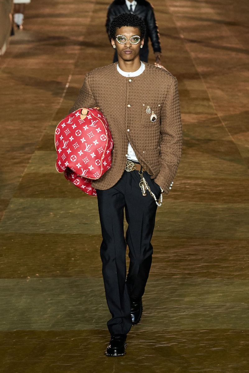 Pharrell's SS24 Louis Vuitton Debut Was Nothing Short of a Spectacle Paris fashion week pont neuf jay z beyonce rihanna asap rocky asap ferg pusha t verdy pharrell williams maluma jbalvin lewis hamilton fenty