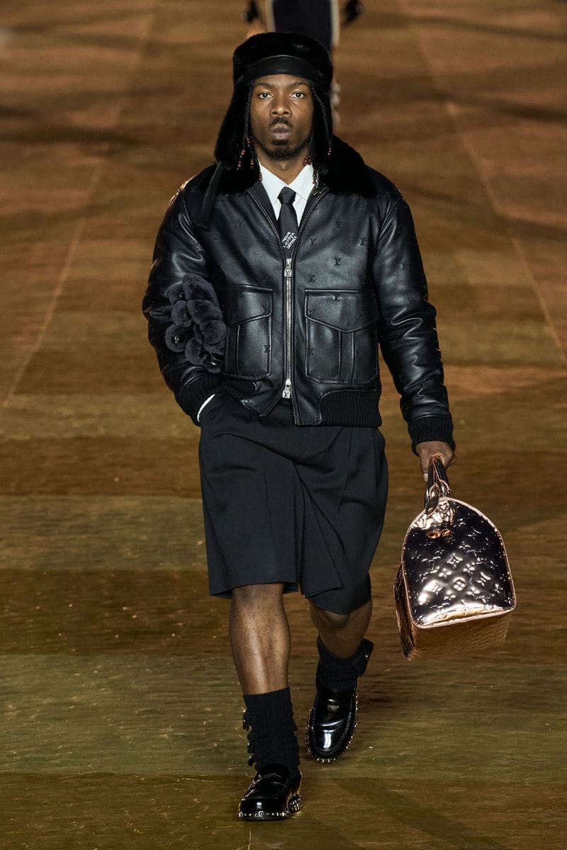 Pharrell's SS24 Louis Vuitton Debut Was Nothing Short of a Spectacle Paris fashion week pont neuf jay z beyonce rihanna asap rocky asap ferg pusha t verdy pharrell williams maluma jbalvin lewis hamilton fenty
