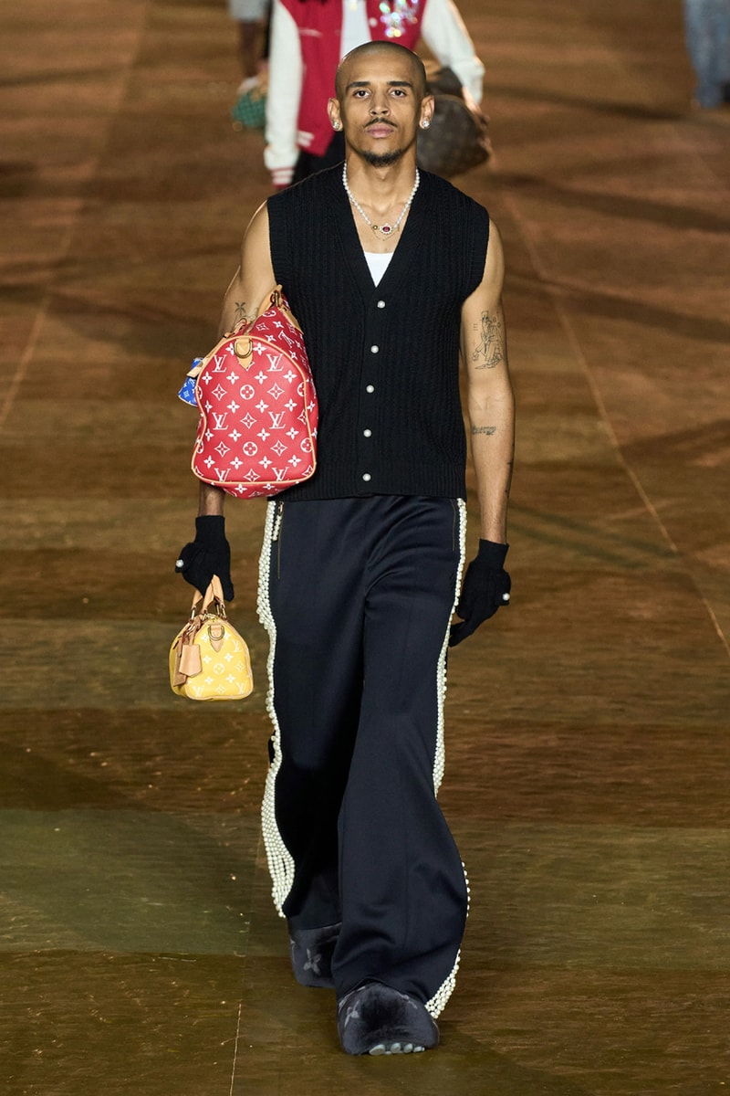 Pharrell's SS24 Louis Vuitton Debut Was Nothing Short of a Spectacle Paris fashion week pont neuf jay z beyonce rihanna asap rocky asap ferg pusha t verdy pharrell williams maluma jbalvin lewis hamilton fenty