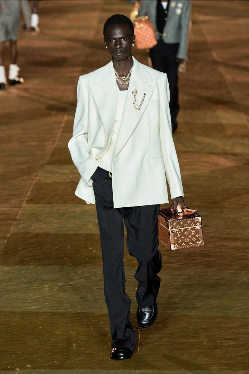 Pharrell's SS24 Louis Vuitton Debut Was Nothing Short of a Spectacle Paris fashion week pont neuf jay z beyonce rihanna asap rocky asap ferg pusha t verdy pharrell williams maluma jbalvin lewis hamilton fenty