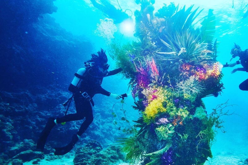 Azuma Makoto Submerges Floral Installation in Uncharted Ocean Waters in bloom artist creative flowers natural world coexist japanese sea nature natural world texture shape color vibrant display installation arrangement