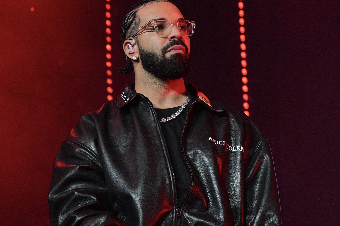 Drake Debuts Nike NOCTA Hot Step 2 During 'It's All a Blur' Tour 21 savage rapper 6god neon orange neon green 