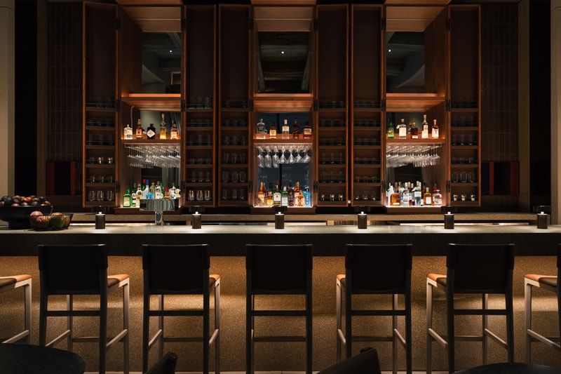 Yabu Pushelberg Designs New Dual Branded LA Hotels los angeles the moxy marriott the ac hotel spanish hacienda aesthetic wood birch california elevated designs sophisticated George Yabu and Glenn Pushelberg custom display installation floral furniture oak design art
