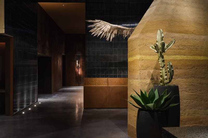 Yabu Pushelberg Designs New Dual Branded LA Hotels los angeles the moxy marriott the ac hotel spanish hacienda aesthetic wood birch california elevated designs sophisticated George Yabu and Glenn Pushelberg custom display installation floral furniture oak design art