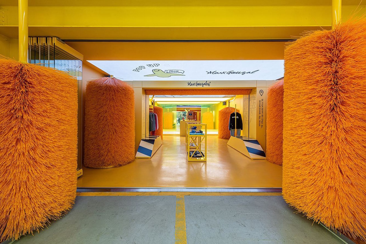 Mark Gonzales Brings Car Wash-Inspired Pop-Up To South Korea seoul industrial Seongdong-gu district skate streetwear los angeles car wash yellow orange graphics merchandise available everyday spaces such as game arcades, small markets, auto repair shops, and public saunas niiiz design lab