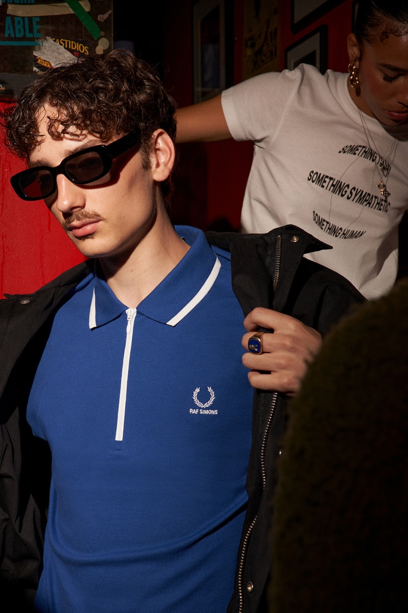 fred perry raf simons final collaboration collection wrap up tiktok moments 90s counter culture polo shirt cardigans diy music 100 club london 
