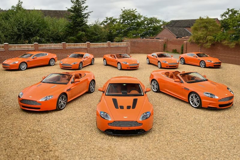 Collection of Eight Orange 2010 Aston Martins Are Heading to Auction