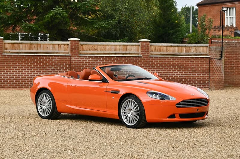 Set of Eight Orange 2010 Aston Martins Are Heading to Auction bonhams citrus colored james bond dbs coupé dbs volante athletic gt v12 vantage coupe roadster