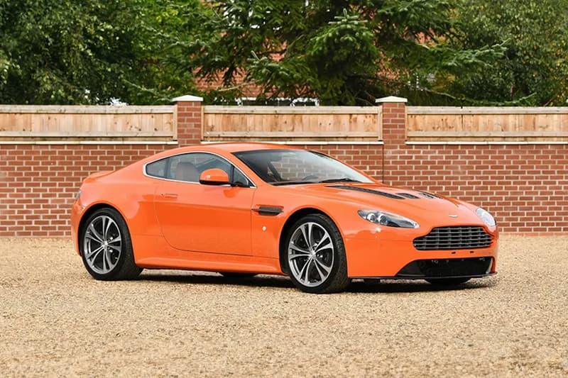 Set of Eight Orange 2010 Aston Martins Are Heading to Auction bonhams citrus colored james bond dbs coupé dbs volante athletic gt v12 vantage coupe roadster