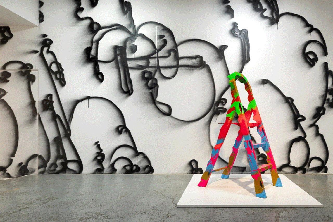 virgil abloh brings an urban language to galerie kreo with  graffiti-sprayed, concrete furniture