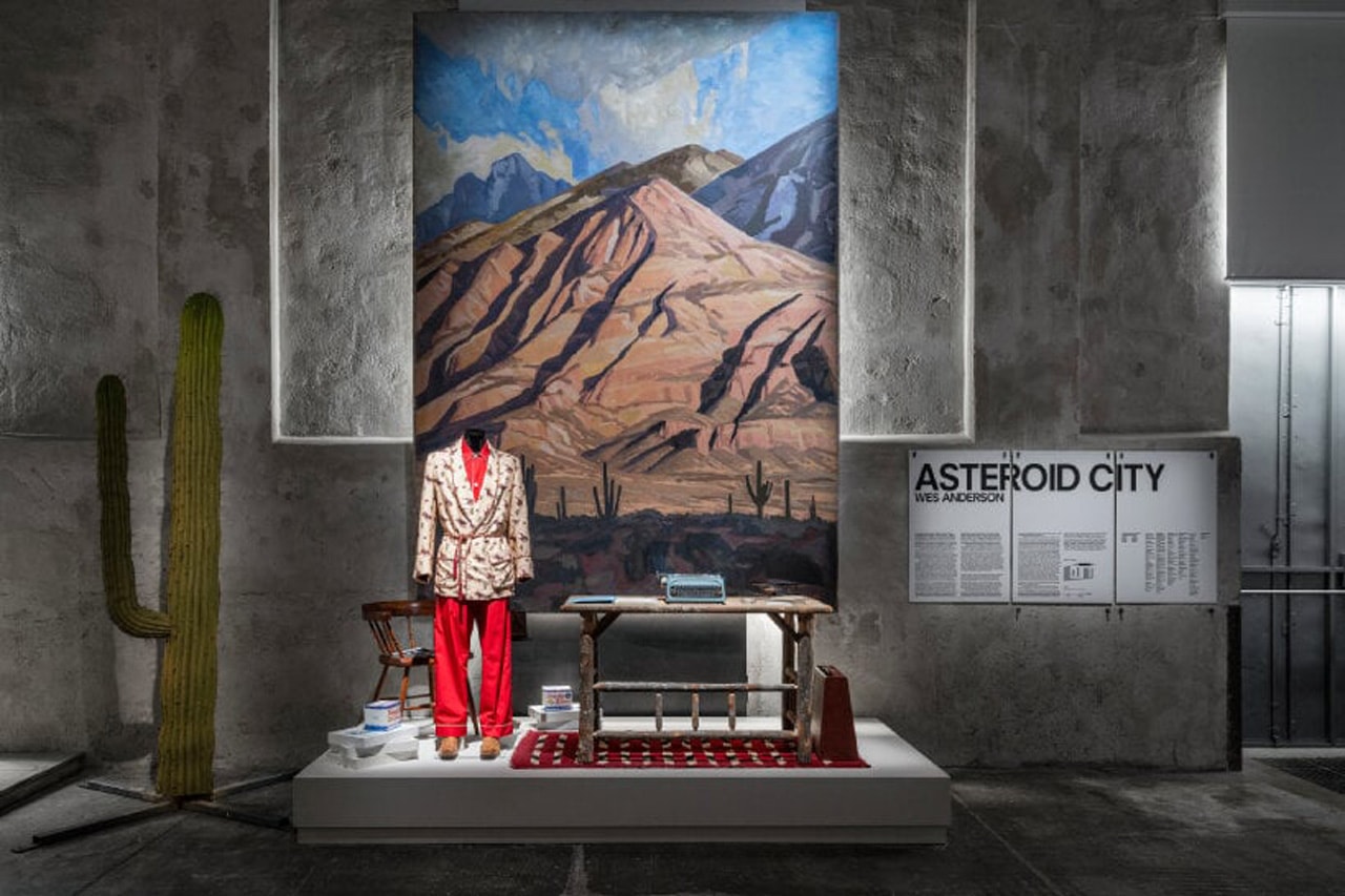 Step Into Wes Anderson's 'Asteroid City', Located Inside Milan's Fondazione Prada props set design pieces costumes cigarettes clothes fantastic mr fox film director italy london exhibit immersive pastel desert western death grief eleventh feature