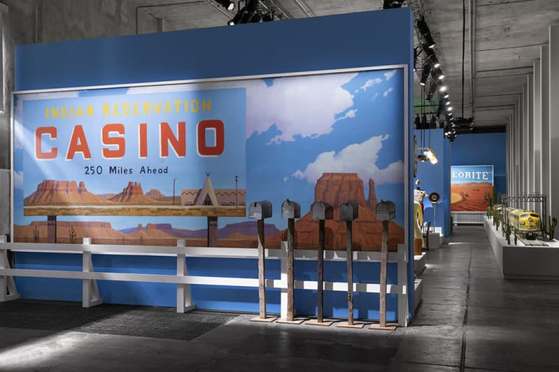 Step Into Wes Anderson's 'Asteroid City', Located Inside Milan's Fondazione Prada props set design pieces costumes cigarettes clothes fantastic mr fox film director italy london exhibit immersive pastel desert western death grief eleventh feature