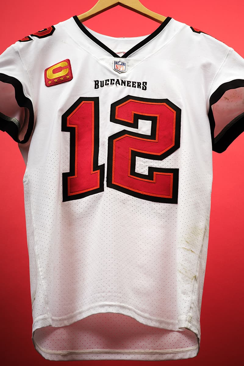 Tom Brady's Final Game-Worn Jersey Is Auctioning for $1.5 Million USD nfl sotheby's auction tampa bay buccaneers american football quarterback goat nfc dallas cowboys