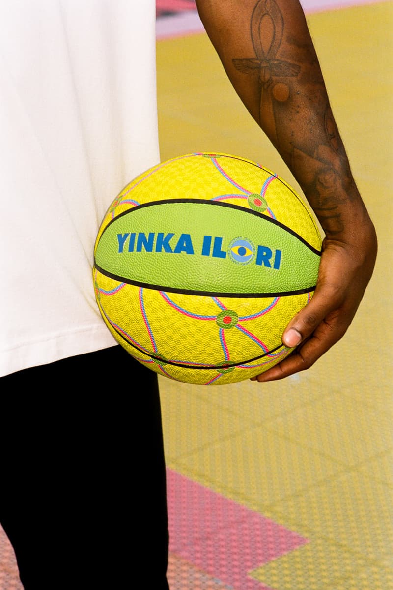 Yinka Ilori Yinka Ilori's 'Ojukokoro' Collection Is About More Than Just Basketball U.S. debut moma mcm frieze design art features interview exclusive uk london british artist designer t shirt apparel release nigerian greed vibrant color pop mindful homeware home objects umbrella pillow rug cushion water bottle yoruba language