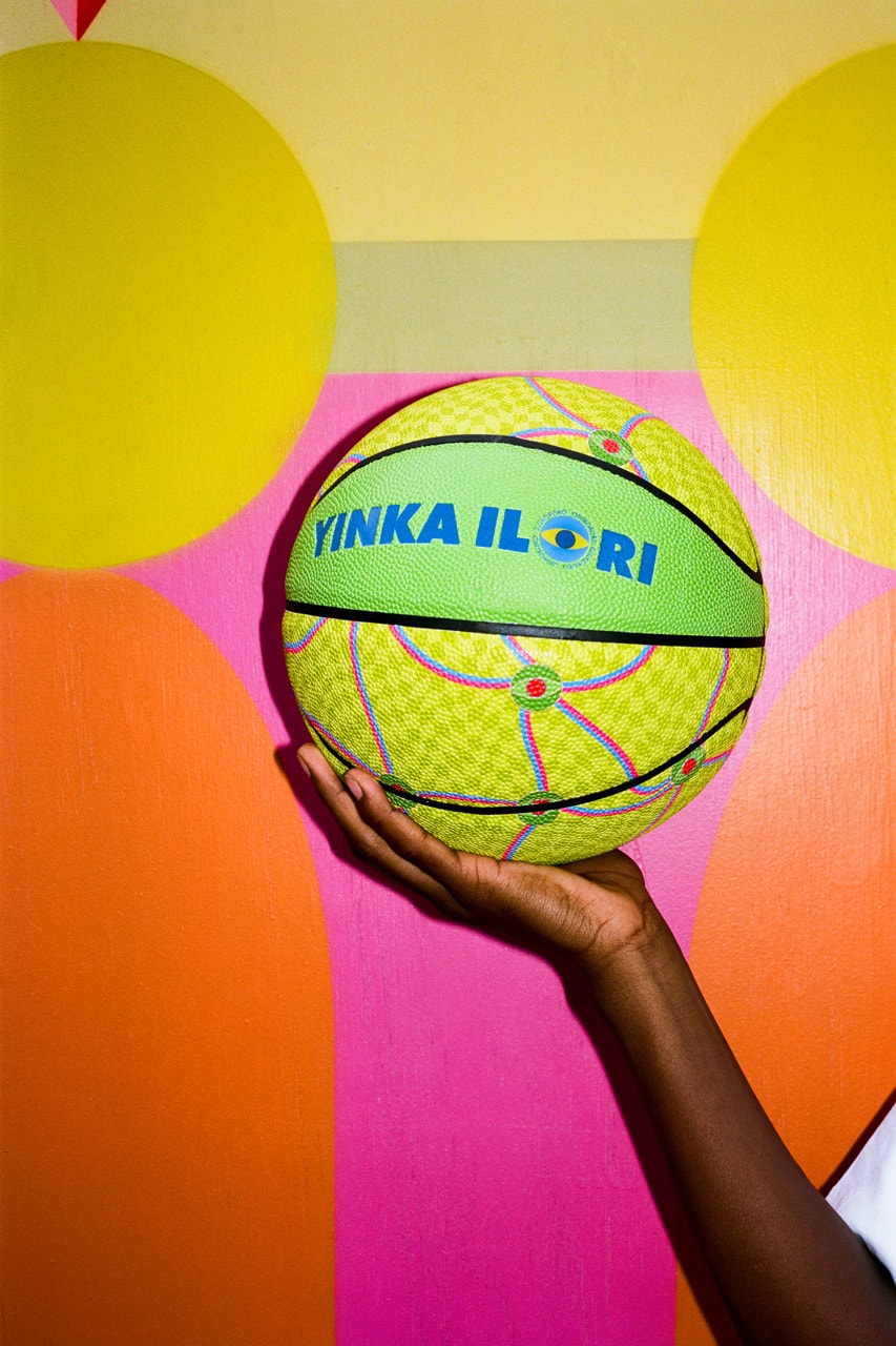 Yinka Ilori Yinka Ilori's 'Ojukokoro' Collection Is About More Than Just Basketball U.S. debut moma mcm frieze design art features interview exclusive uk london british artist designer t shirt apparel release nigerian greed vibrant color pop mindful homeware home objects umbrella pillow rug cushion water bottle yoruba language