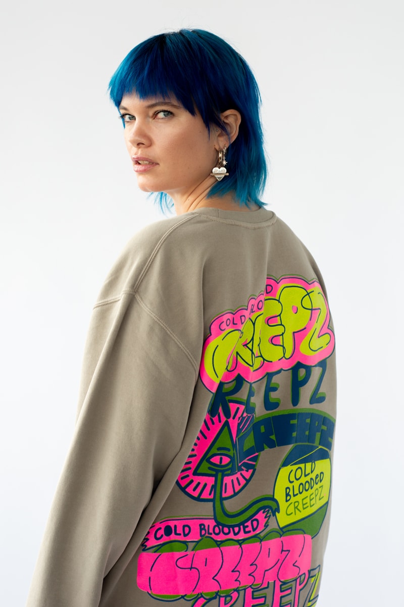 creepz nft overloads end. clothing line invasion reptile cold blooded varsity jacket nfc technology t-shirt streetwear web3 met averse