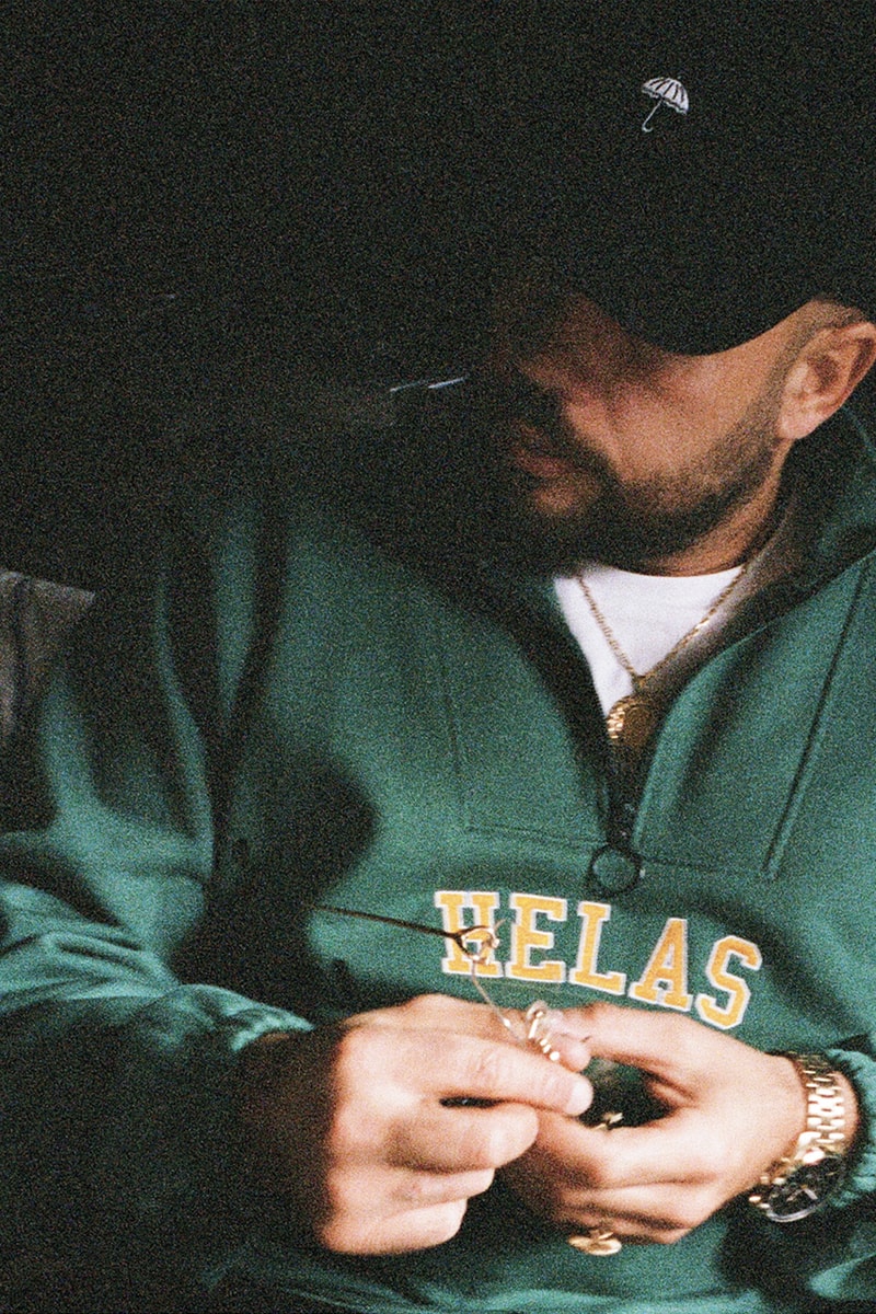 Hélas Takes You on a Holiday Cabin Getaway for Winter 2023 lookbook release info post-athleisure cabin vibes old world chateau surrounding forests balaclava earthy tones 