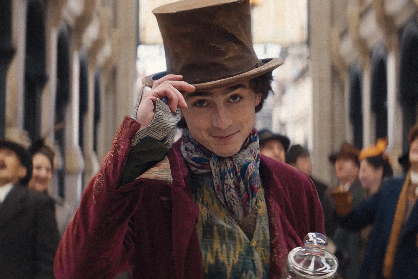 Initial Reactions for 'Wonka' Praise Timothée Chalamet as "Infinitely Charming" and the Film "Shockingly Good" chocolate christmas holiday candy hugh grant