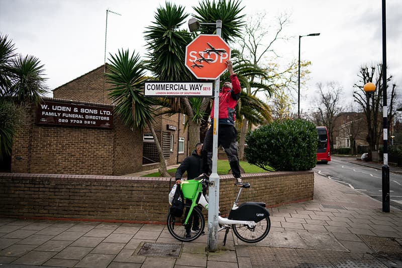 New Banksy Stop Sign Art Stolen Less Than an Hour After Unveiling peckham selfish south london southampton way commercial way military drones gaza palestine israel