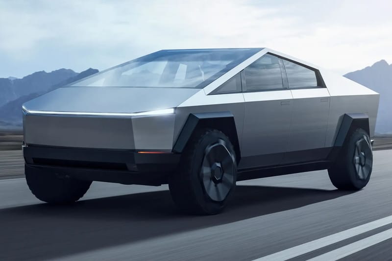 Watch the Tesla Cybertruck Beat a Porsche 911 in a Drag Race While Towing Another Porsche