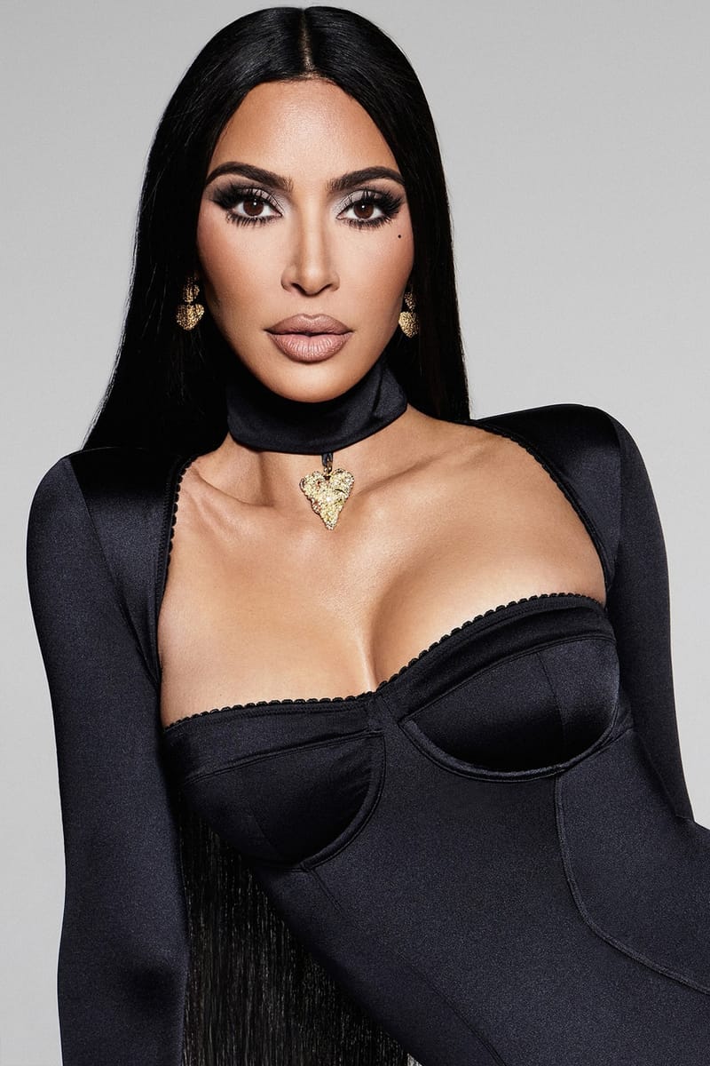 Kim Kardashian Poses in Late Night Intimates for New Stretch Satin SKIMS Campaign Veneda Carter gold bold heart pendant lustruous kim k shape wear onyx