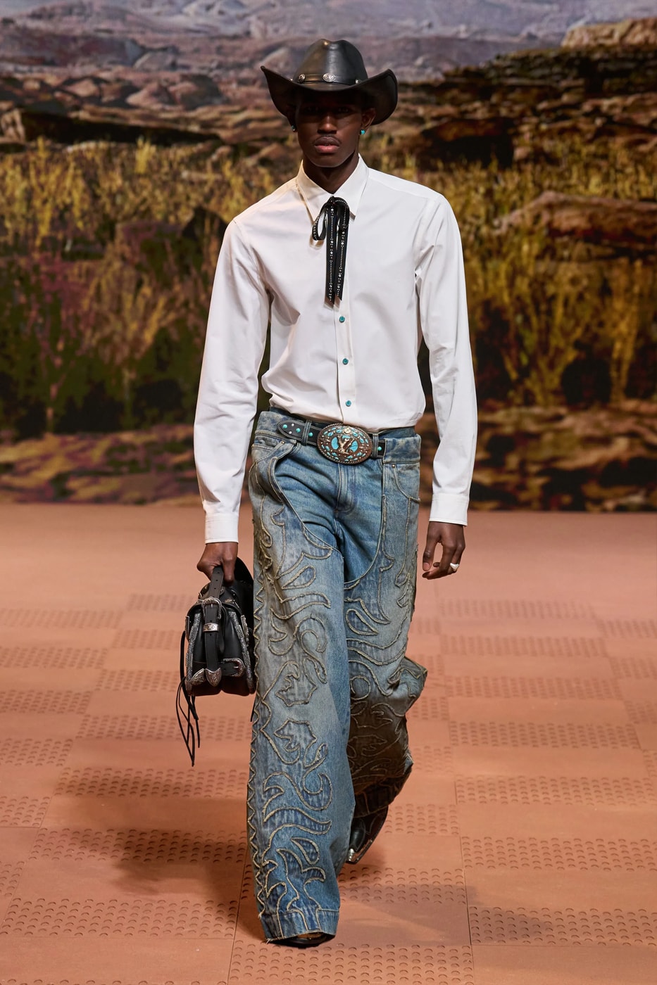 Louis Vuitton Fall Winter 2024 Paris Fashion Week menswear Pharrell Williams runway show harmonica cowboy western motifs timbaland boots swae lee sioux mumford and sons miley cyrus new song