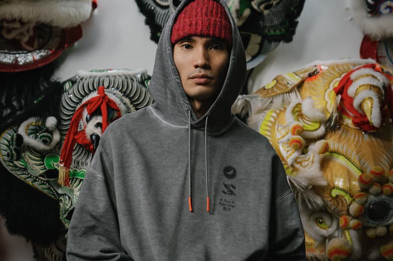 STAPLE and PUMA Join Forces for a Celebratory "Year of the Dragon" Collection collaboration lunar new year lion dance club new york city chinese fremasons athletic club cfmac sneakers granola alpine snow puma black suede sweatpants hoodie tshirt