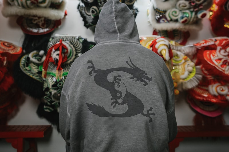 STAPLE and PUMA Join Forces for a Celebratory "Year of the Dragon" Collection collaboration lunar new year lion dance club new york city chinese fremasons athletic club cfmac sneakers granola alpine snow puma black suede sweatpants hoodie tshirt