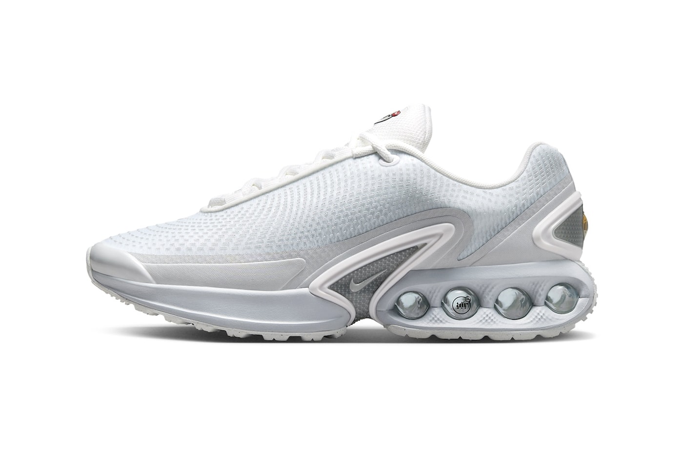 Nike Air Max DN Surfaces in a Clean White/Metallic Silver Colorway FJ3145-100 Release Info air max day swoosh