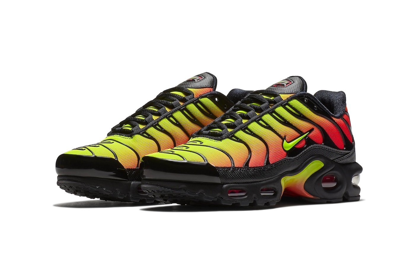 Nike Air Max Plus "Volt/Solar Red" Slated To Return Late This Year AQ9979-001 black volt solar red swoosh technical shoe vibrant neon