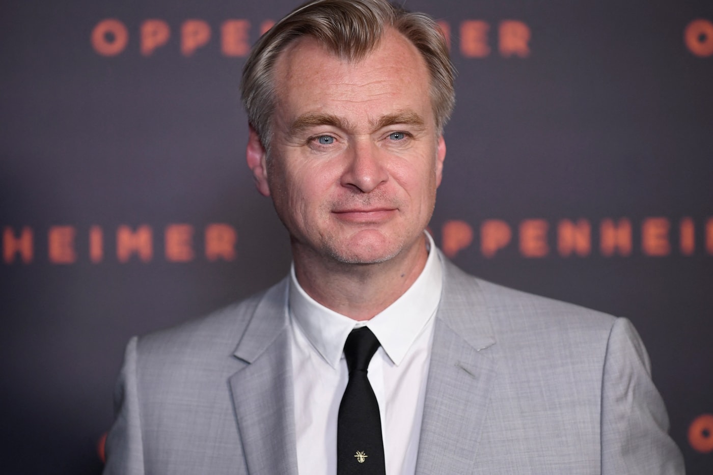 Christopher Nolan Reportedly Cashed in Nearly $100 Million USD from 'Oppenheimer' period drama atomic bomb oscars robert downey jr emily blunt cillian murphy