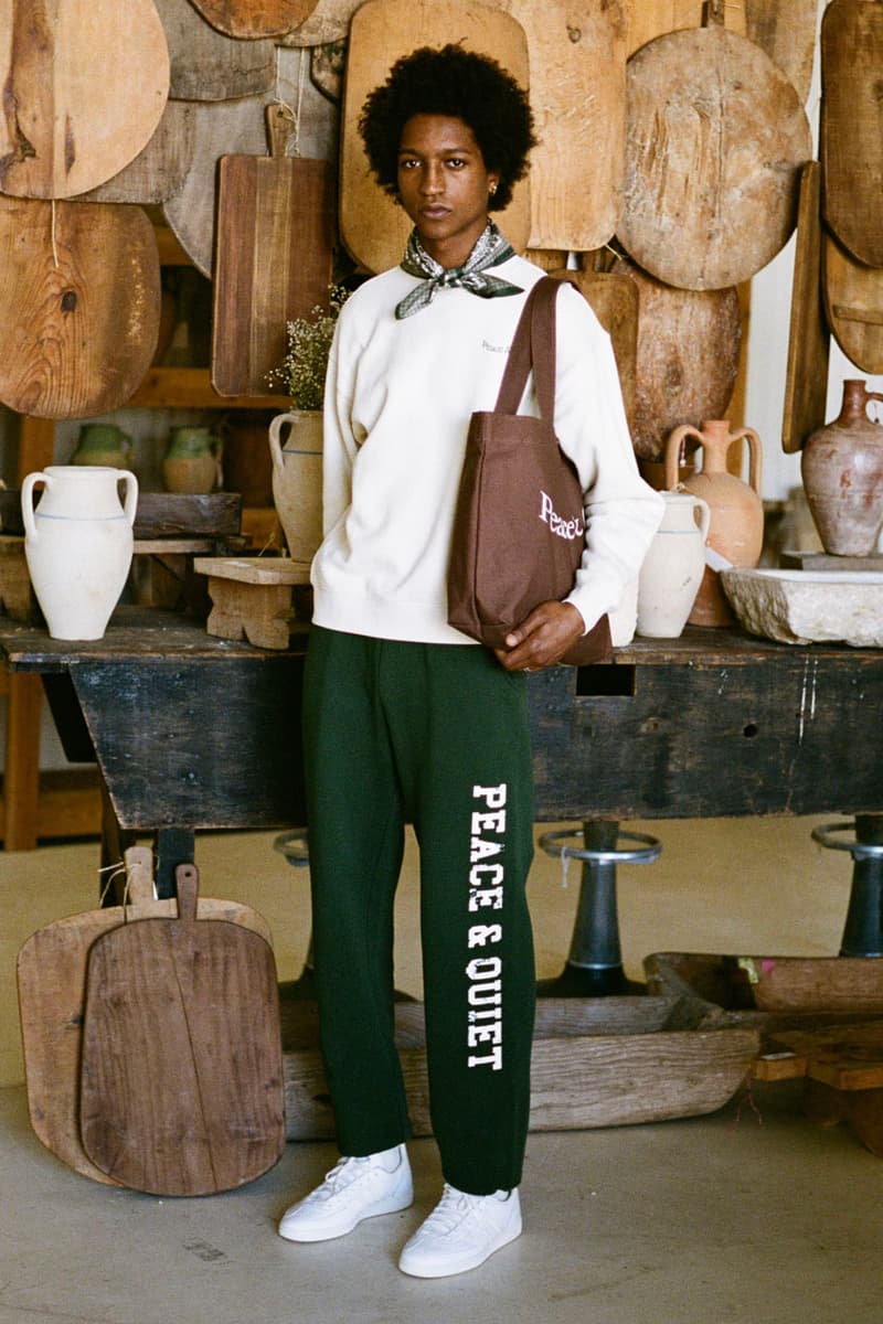 Museum of Peace & Quiet Prioritizes Wellness in First SS24 Drop collection capsule spring summer 2024 release link delivery price website hbx and hoodie crewneck sweatpants graphic mind body loungewear sleep set tracksuit green blue peace candle home goods ashtray tote bag