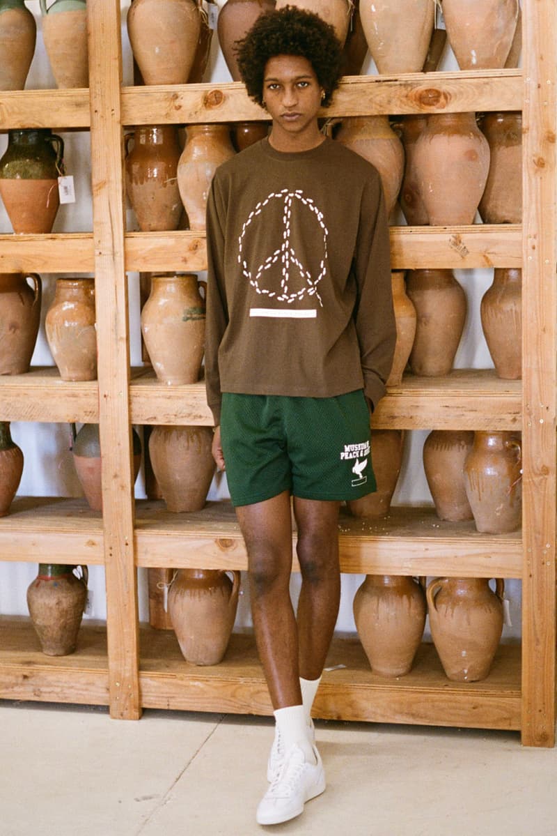 Museum of Peace & Quiet Prioritizes Wellness in First SS24 Drop collection capsule spring summer 2024 release link delivery price website hbx and hoodie crewneck sweatpants graphic mind body loungewear sleep set tracksuit green blue peace candle home goods ashtray tote bag