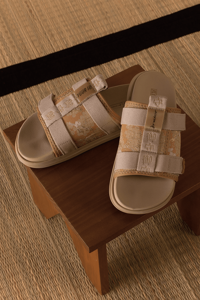 rider your id footwear collaboration slides amulet motif black beige
